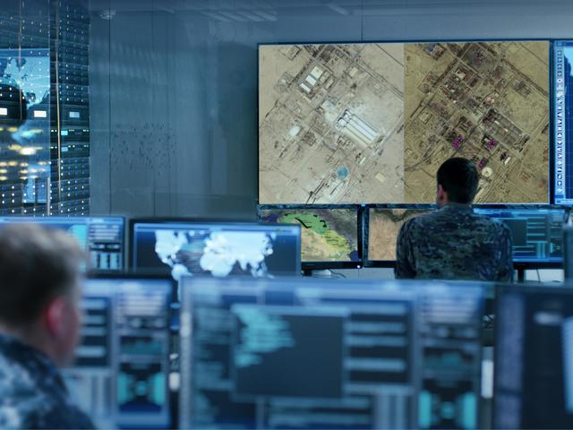Military man analysing satellite imagery for Intelligence operations