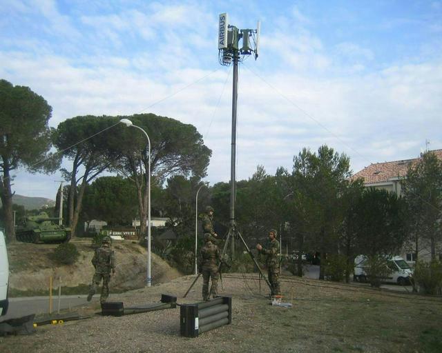 Military soldiers assembling and looking at the BLR product