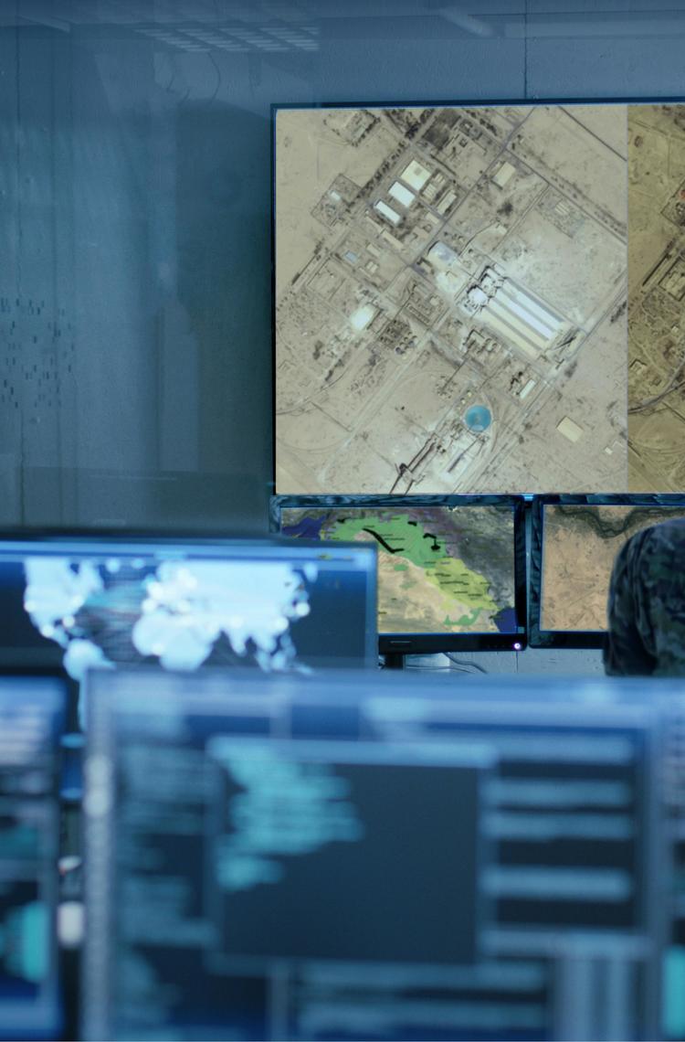 Military man analysing satellite imagery for Intelligence operations