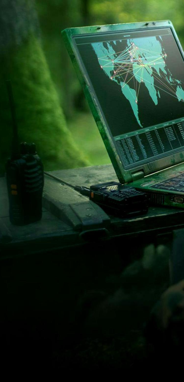 Soldier on computer analysing potential threats