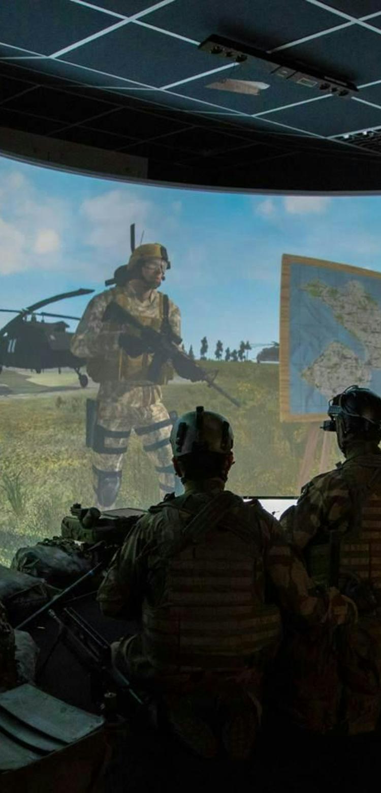 Soldiers in a training centre using augmented or virtual reality for training purposes 