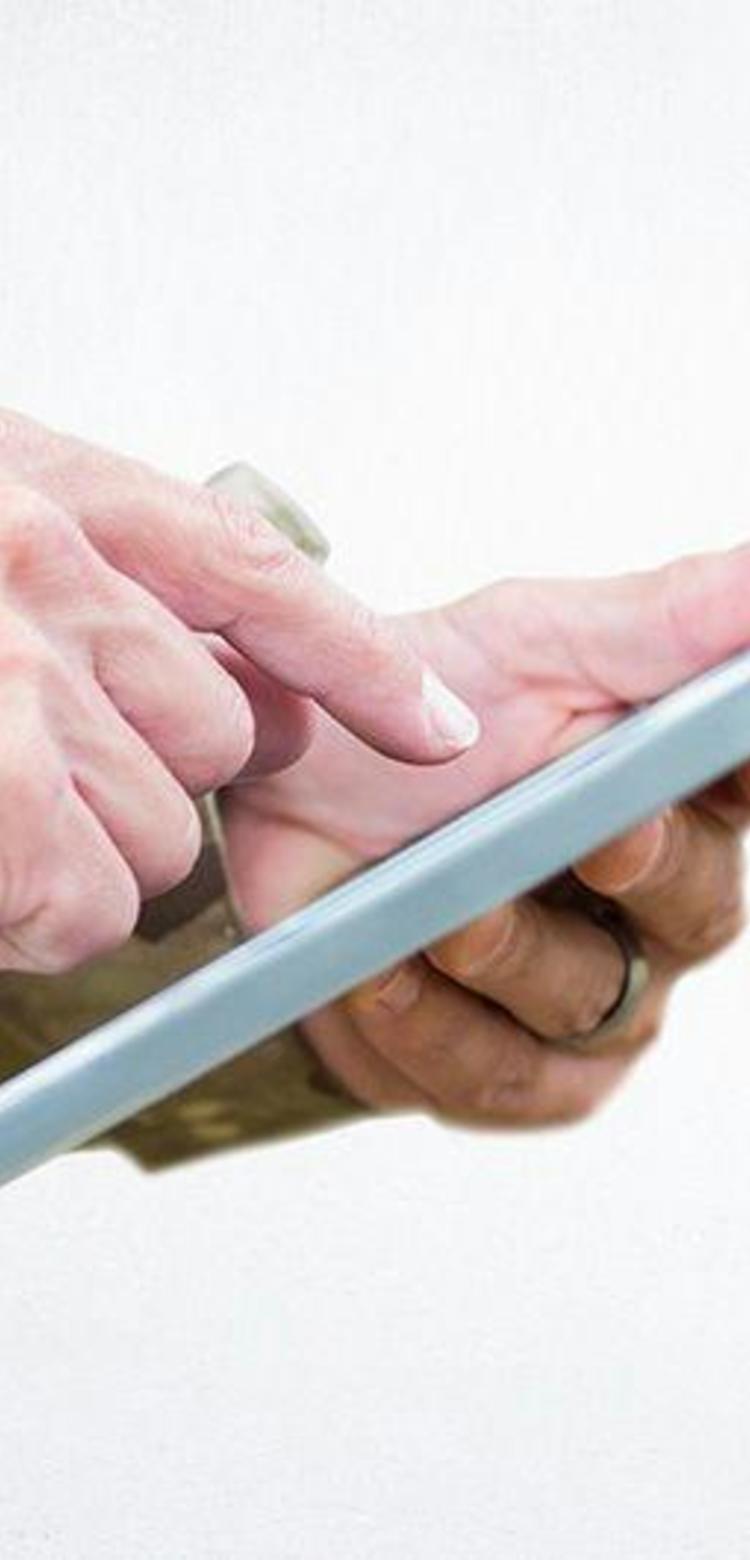 Soldier with tablet in his hand