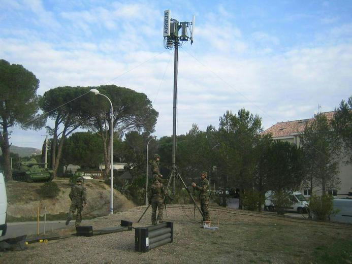 Military soldiers assembling and looking at the BLR product